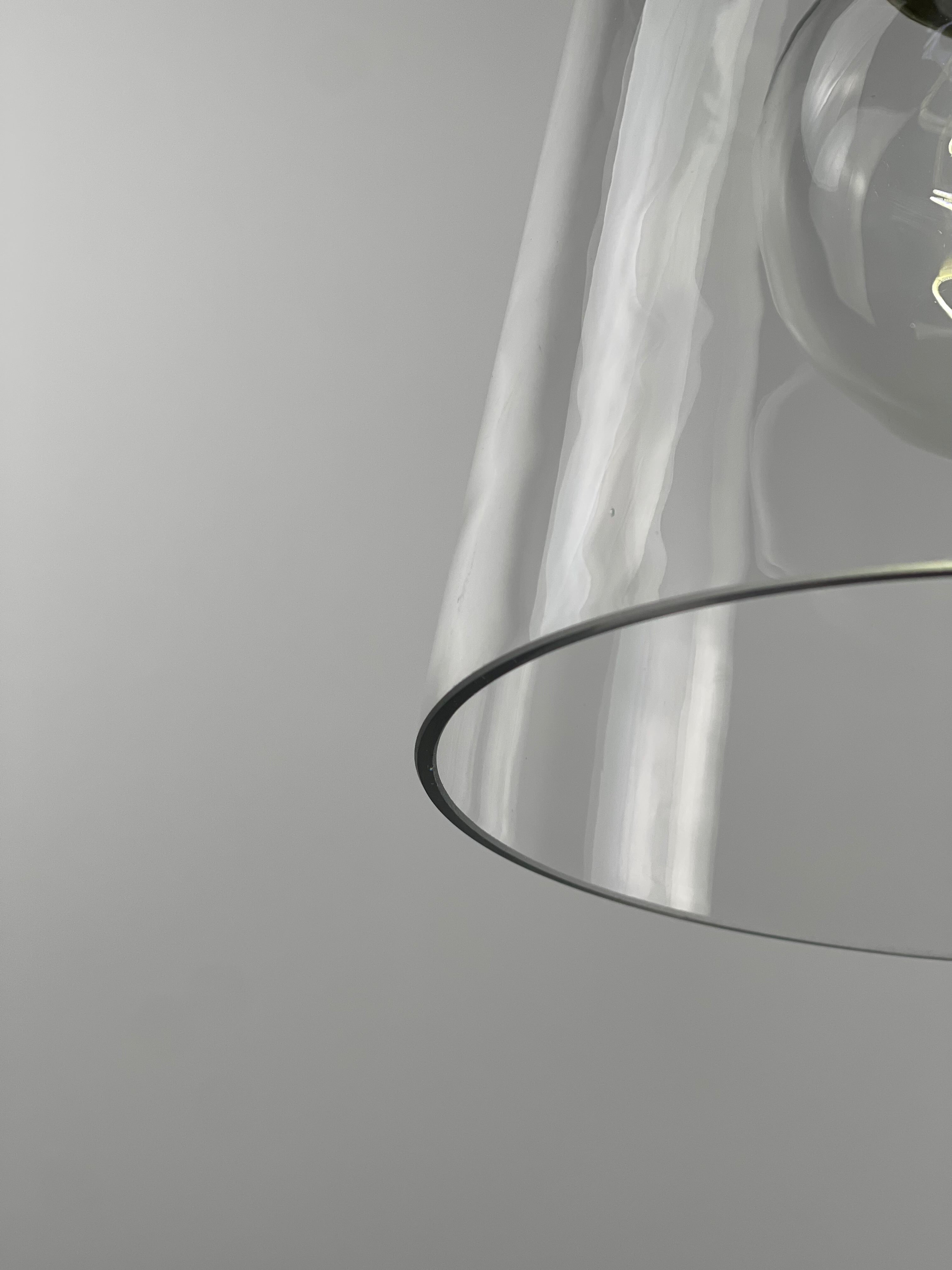 Close up of Clear Cylinder Glass Oil-Rubbed Bronze Instant Pendant Light