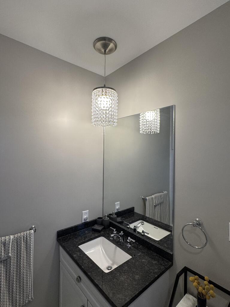 Customer submitted 5 star review with photo featuring Brushed Nickel Crystal Shade Instant Pendant