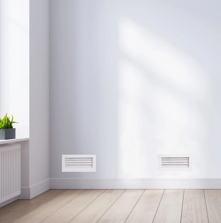 Luxury White Primed Wood Out-take Registers installed on wall