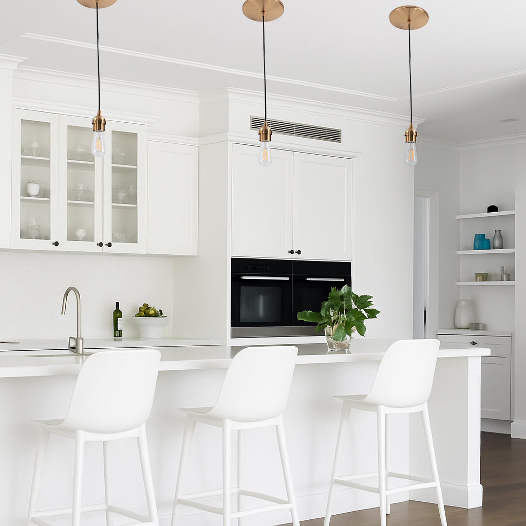 Picture of Satin Brass Instant Pendant Light installed over a kitchen counter